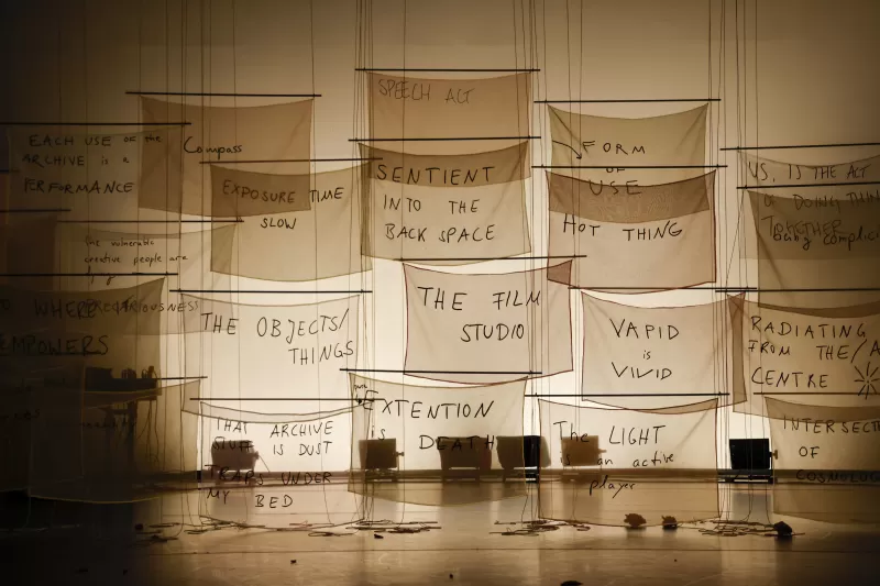 Backlit banners with empty stage, Tanzfabrik Berlin, June 2021 – photo by Anja Weber