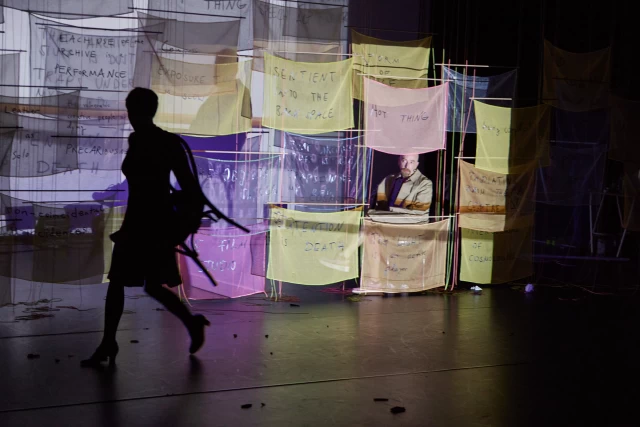 Britta performing the chair dance with William watching, Tanzfabrik Berlin, June 2021 – photo by Anja Weber