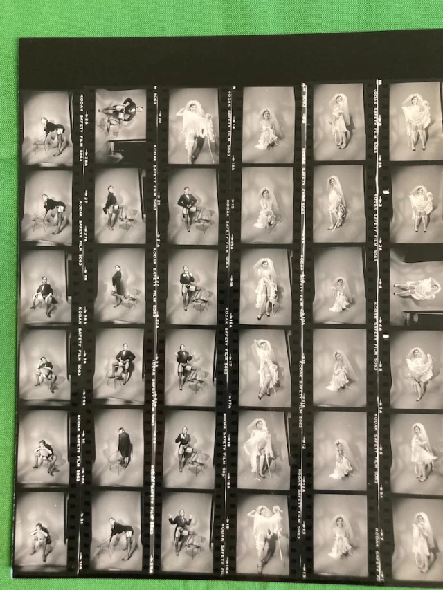 PR strip shots nightclub windows & posters, Margaret's Marlene Dietrich & Bride characters; photographer Ric Amis